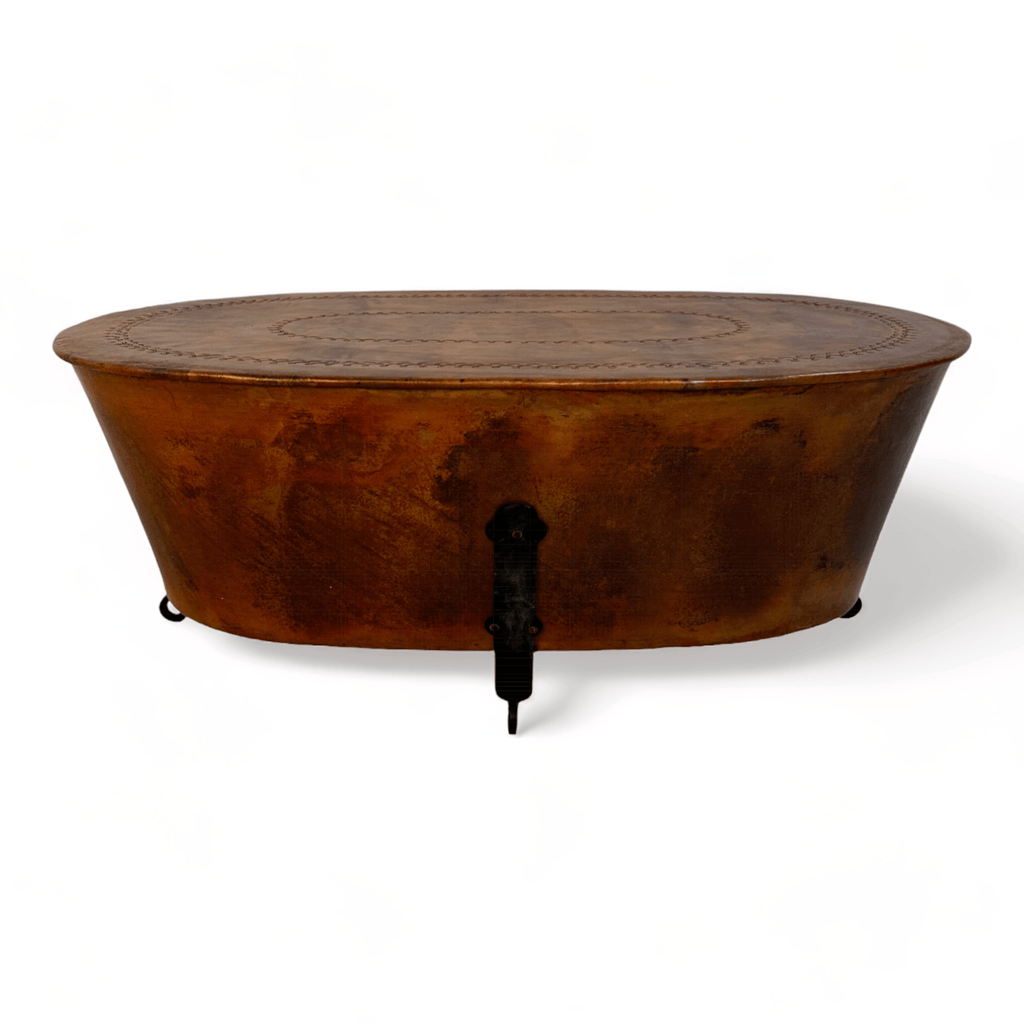 The Midnight Copper Cauldron Coffee Table anchors your living space with unparalleled craftsmanship. Hand-hammered copper forms the tabletop, while blacksmith-forged wrought iron legs provide a sturdy base. With its rich patina, this table not only serves a function but also adds a layer of aesthetic allure to your home.