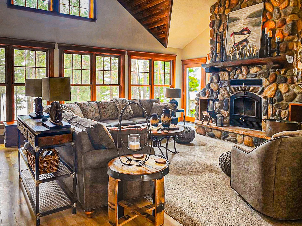 Great room with vaulted wood ceiling and stone fireplace, Moose Hollow project, Northern Wisconsin